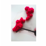 aquarelle abstraite brodée avec de la laine fushia